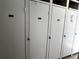 Hallway with a row of locked storage units numbered 520, 521, 524, and 525 at 8977 Midnight Pass Rd # 521, Sarasota, FL 34242