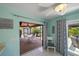 Cozy breakfast nook with sliding doors, ideal for enjoying morning coffee at 9089 Berendo Ave, Englewood, FL 34224