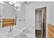 Bright bathroom featuring modern fixtures and unique tile flooring at 919 Palm View Way, Sarasota, FL 34240