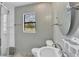 Bright modern bathroom with a glass-enclosed shower and sleek fixtures at 919 Palm View Way, Sarasota, FL 34240