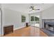 Bedroom features a fireplace and sliding glass door access to private balcony at 919 Palm View Way, Sarasota, FL 34240
