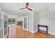 Spacious bedroom with French door access to screened in porch and fireplace at 919 Palm View Way, Sarasota, FL 34240
