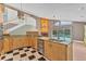 Beautiful kitchen with a view of the pool, custom cabinets, and plenty of counter space at 919 Palm View Way, Sarasota, FL 34240