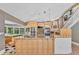 Open kitchen with granite countertops, stainless steel appliances and a view of the backyard at 919 Palm View Way, Sarasota, FL 34240