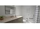 Bathroom featuring a vanity with a plant, a framed art piece, and a shower/tub with striped curtain at 1016 Rhodes Ave, Sarasota, FL 34237