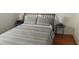 Comfortable bedroom with a queen-sized bed and stylish nightstands on each side at 1016 Rhodes Ave, Sarasota, FL 34237