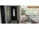 Inviting entryway featuring a stylish front door, neutral decor, and an adjacent living room at 1016 Rhodes Ave, Sarasota, FL 34237