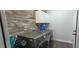 Well-equipped laundry room with modern washer and dryer units and ample storage space at 1016 Rhodes Ave, Sarasota, FL 34237