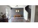 Stylish office with a wooden desk, and a decorative dark plank wall, perfect for remote work at 1016 Rhodes Ave, Sarasota, FL 34237