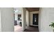 Inviting porch with arched columns and outdoor seating provides a relaxing outdoor space at 1016 Rhodes Ave, Sarasota, FL 34237