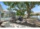 Enjoy an outdoor lifestyle with screened-in pool, seating, and ample space to relax at 1019 S Tuttle Ave, Sarasota, FL 34237
