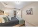 Comfortable bedroom features a queen bed and attractive wall art at 1019 S Tuttle Ave, Sarasota, FL 34237