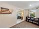 Inviting entryway leading to a cozy living room with natural light and stylish decor at 1019 S Tuttle Ave, Sarasota, FL 34237