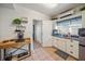 Kitchenette with modern amenities and cozy coffee bar setup at 1019 S Tuttle Ave, Sarasota, FL 34237