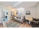 Cozy living room with comfortable seating and adjacent dining area at 1019 S Tuttle Ave, Sarasota, FL 34237