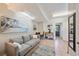 Open-concept living space connecting to kitchen and outdoor entry at 1019 S Tuttle Ave, Sarasota, FL 34237