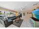 Inviting living room with tiled floors, view of dining, and access to front entrance at 1019 S Tuttle Ave, Sarasota, FL 34237