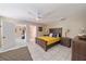 Spacious primary bedroom with a ceiling fan and tile flooring at 1019 S Tuttle Ave, Sarasota, FL 34237
