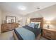 Relaxing bedroom with tiled floors and rustic wood furniture at 1019 S Tuttle Ave, Sarasota, FL 34237