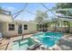 Inviting screened-in pool and spa offer a refreshing outdoor retreat at 1019 S Tuttle Ave, Sarasota, FL 34237