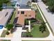 Aerial view showcasing solar panels, landscaping, and location in a residential neighborhood at 11021 4Th E Ave, Bradenton, FL 34212
