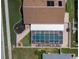 Birds eye view of the house highlighting the roof, pool, garden, and landscaping at 11021 4Th E Ave, Bradenton, FL 34212