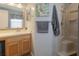 Bathroom featuring neutral tones, vanity with sink, and walk-in shower at 11021 4Th E Ave, Bradenton, FL 34212