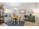 Inviting dining room with neutral tones, stylish furnishings, and ample natural light at 11021 4Th E Ave, Bradenton, FL 34212