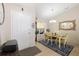 Inviting entryway featuring a dining area with a chandelier and decorative mirror at 11021 4Th E Ave, Bradenton, FL 34212
