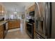 Modern kitchen with stainless steel appliances and ample cabinet space at 11021 4Th E Ave, Bradenton, FL 34212