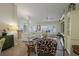 Open living room with tile floors, vaulted ceilings, and ample natural light at 11021 4Th E Ave, Bradenton, FL 34212