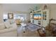 Spacious living room with tile flooring, bright paint, and an abundance of natural light at 11021 4Th E Ave, Bradenton, FL 34212