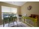 Bright home office with desk, comfortable chair, and natural light at 11021 4Th E Ave, Bradenton, FL 34212