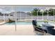 Relaxing pool view with comfortable lounge chairs and a serene setting at 11021 4Th E Ave, Bradenton, FL 34212