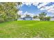 Large back yard with a white vinyl fence at 11208 Blue Sage Pl, Lakewood Ranch, FL 34202