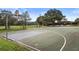 Exterior shot of a basketball court and grassy park at Summerfield Park at 11208 Blue Sage Pl, Lakewood Ranch, FL 34202