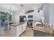 Well-equipped kitchen with stainless steel appliances, granite countertops, and ample storage space at 11208 Blue Sage Pl, Lakewood Ranch, FL 34202