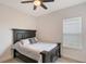 Comfortable bedroom showcasing a bed and a window at 11427 Viani Ter, Palmetto, FL 34221