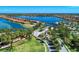 Aerial view of Toscana Isles community with lakes, homes and lush landscaping at 121 Porta Vecchio Bnd # 201, Nokomis, FL 34275