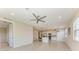 Spacious open floor plan features tile flooring and a modern kitchen with stainless steel appliances at 121 Porta Vecchio Bnd # 201, Nokomis, FL 34275