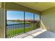 The screened lanai has views of the pond and nearby community homes at 121 Porta Vecchio Bnd # 201, Nokomis, FL 34275