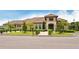 Exterior of the community clubhouse with lush landscaping and prominent address signage at 12358 Lavender Loop, Bradenton, FL 34212