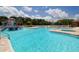 Gorgeous community pool and splash pad with fun water features for Gathering entertainment and a relaxed atmosphere at 12358 Lavender Loop, Bradenton, FL 34212