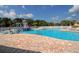Gathering-friendly community pool features a splash pad, play area, and a relaxing swimming experience at 12358 Lavender Loop, Bradenton, FL 34212