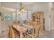 Open-concept dining room offering an inviting atmosphere and seamless transition to the adjacent living spaces at 12358 Lavender Loop, Bradenton, FL 34212