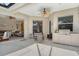 Outdoor patio featuring a built-in grill and ample seating, perfect for entertaining and relaxing at 12358 Lavender Loop, Bradenton, FL 34212
