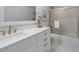Modern bathroom with a marble-look shower, vanity and fixtures at 1255 E Peppertree Dr # 507, Sarasota, FL 34242
