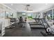Bright fitness center boasts modern equipment and multiple television screens at 1255 E Peppertree Dr # 507, Sarasota, FL 34242