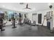 Fitness center with various machines and weights overlooks pool area at 1255 E Peppertree Dr # 507, Sarasota, FL 34242