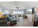 Inviting living room features an open-concept layout with comfortable seating and stylish decor at 1255 E Peppertree Dr # 507, Sarasota, FL 34242
